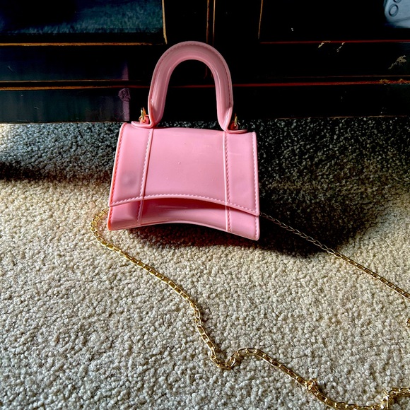 Never used - Mini, rubberized sling bag - Picture 1 of 3